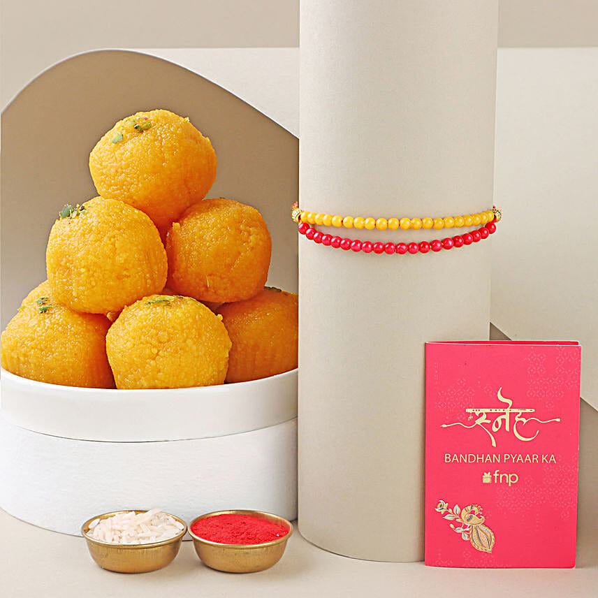 Sneh Red and Yellow Bead Rakhi with Motichoor Laddoo