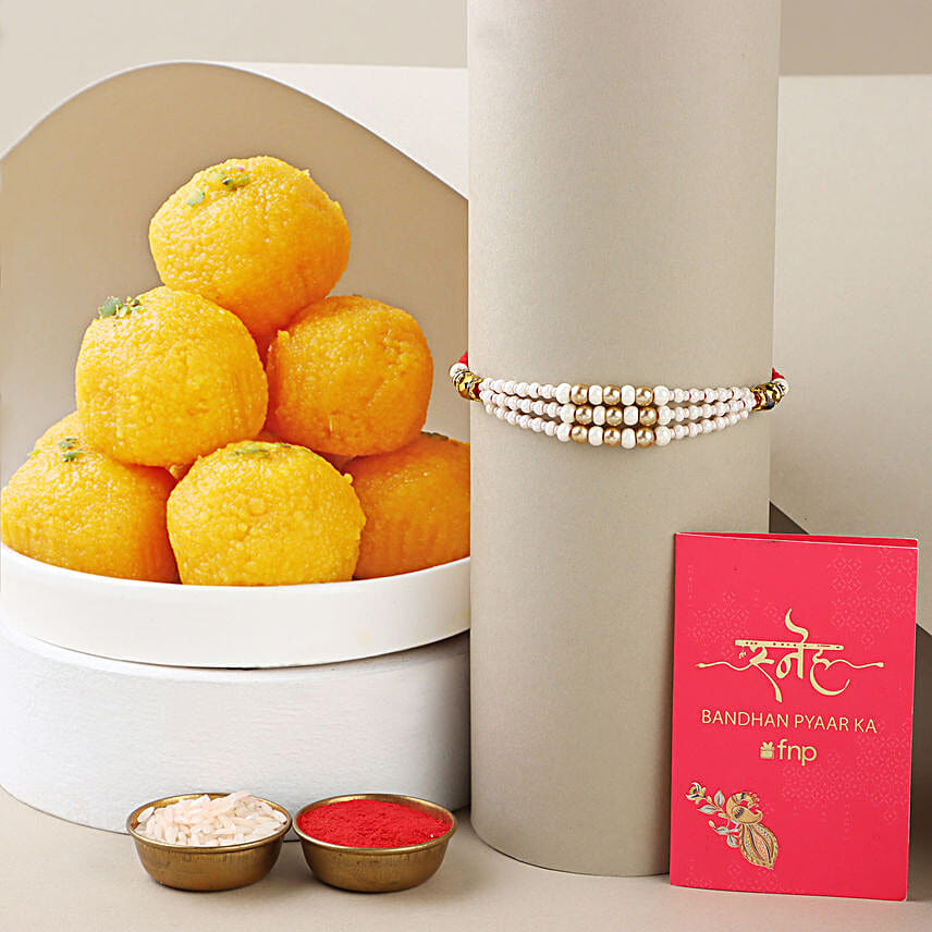 Sneh White Pearl Rakhi with Motichoor Laddoo