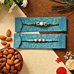 Set Of 2 Pearl Designer Rakhis & Almonds