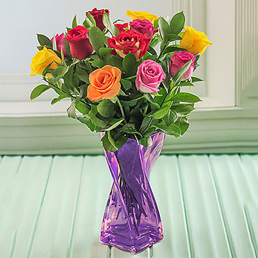 Mixed Roses In A Purple Twisted Vase