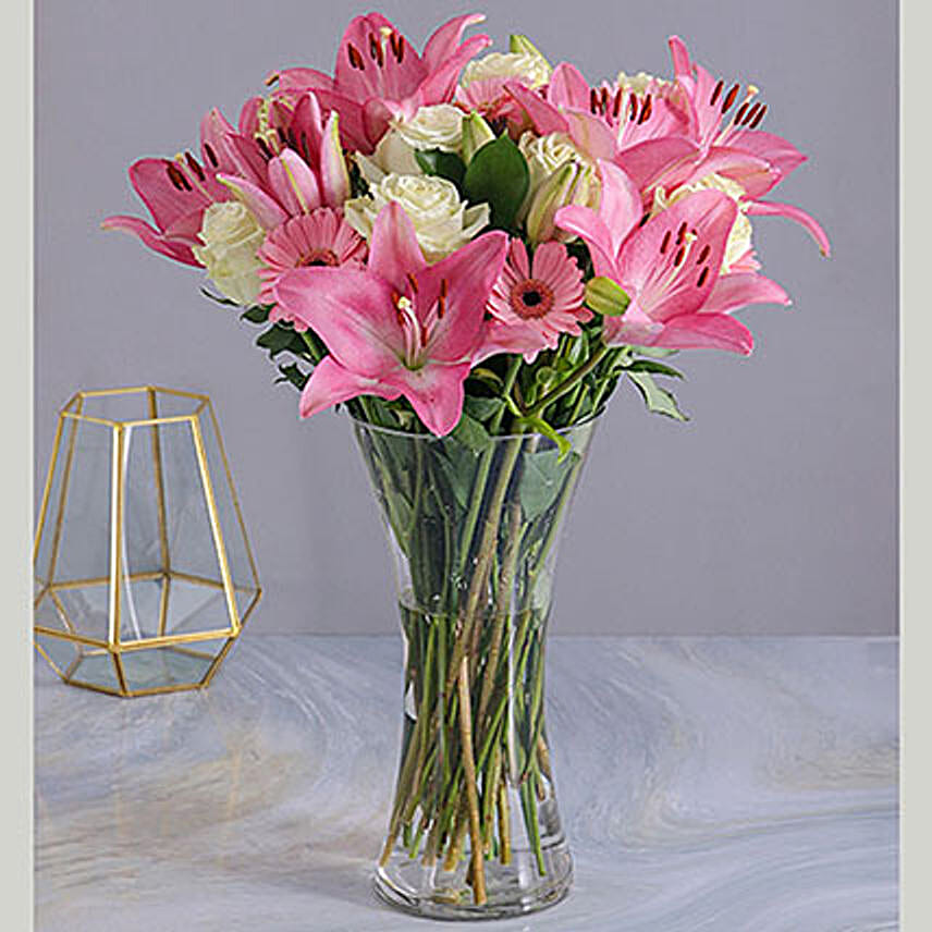 Pastel Seasonal Flowers In A Glass Vase