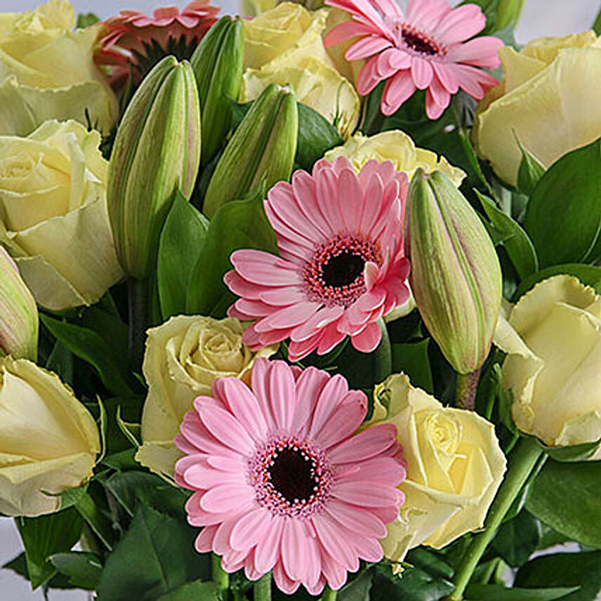 Pastel Seasonal Flowers In A Glass Vase