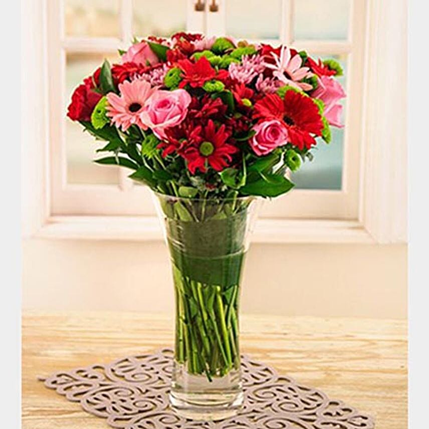 Pink And Red Gerberas Roses And Sprays In Vase