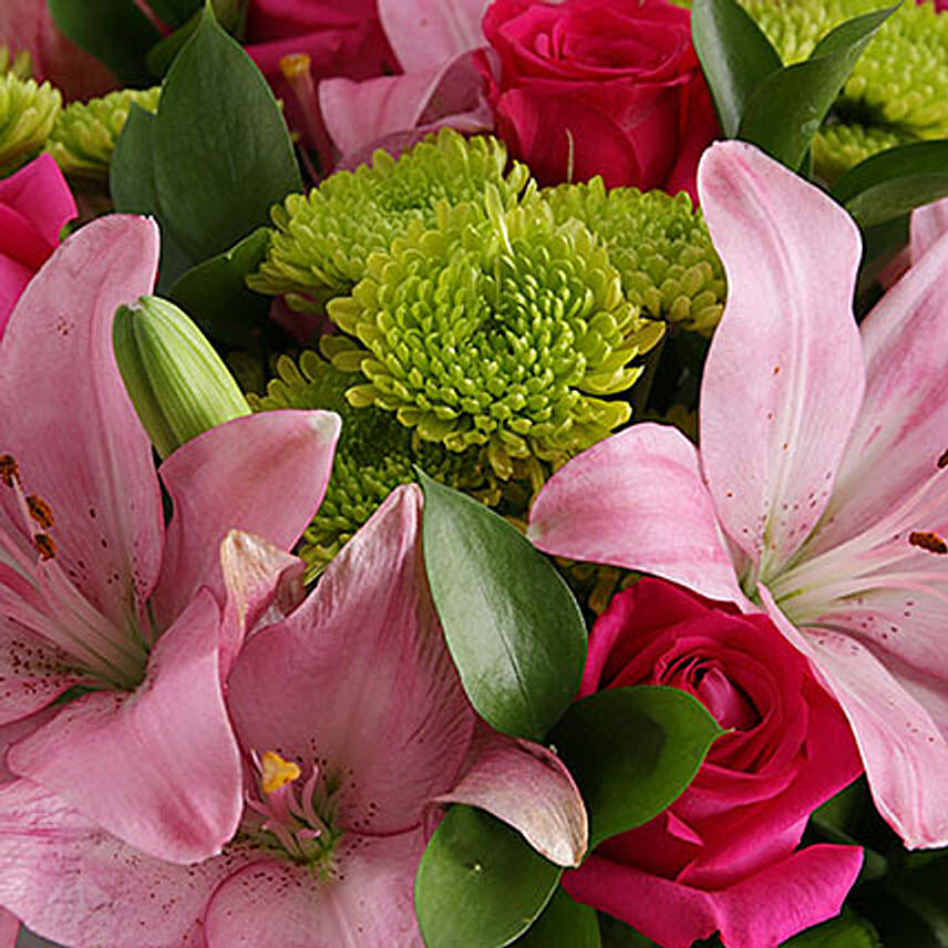 Pretty In Pink Lilies And Cerise Roses In A Vase