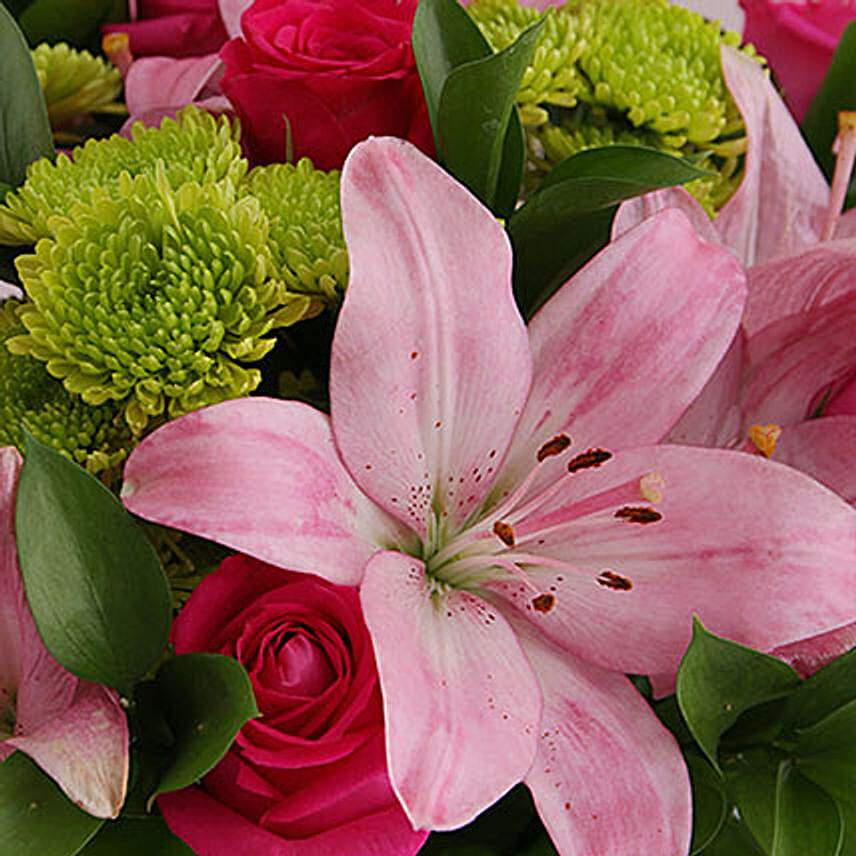 Pretty In Pink Lilies And Cerise Roses In A Vase