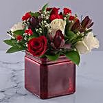 Vase Of Red And Cream Roses