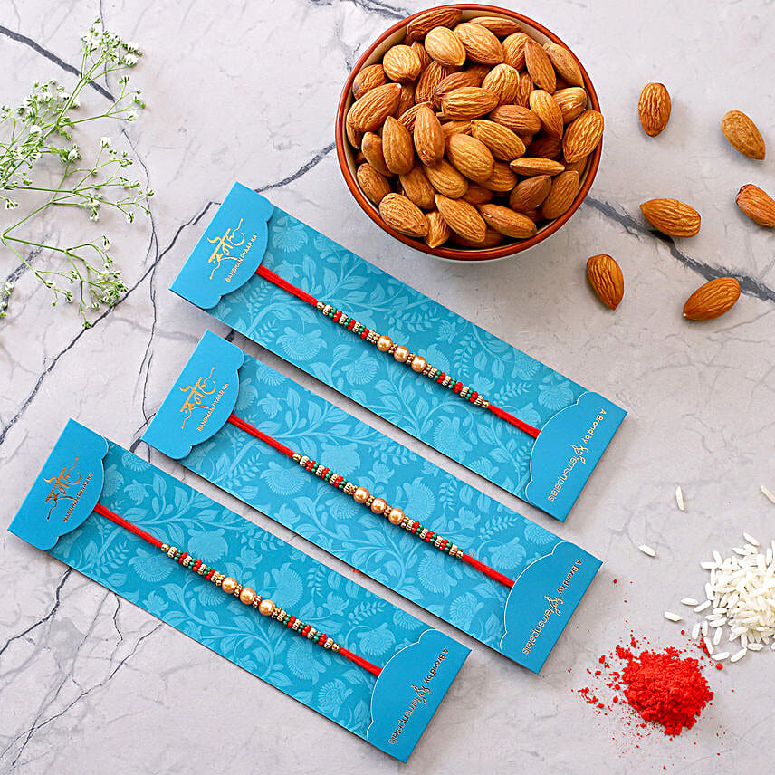 Ethnic Pearl Mauli Rakhis Set And Healthy Almonds