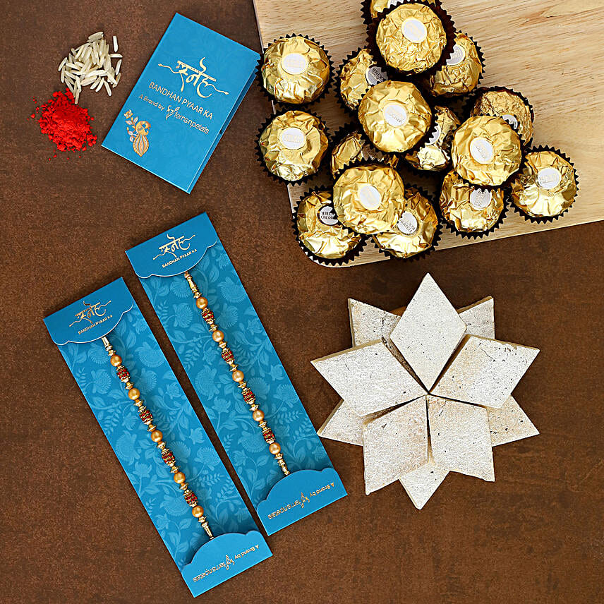 2 Golden Pearl Rakhis With Kaju Katli And Ferrero Rocher