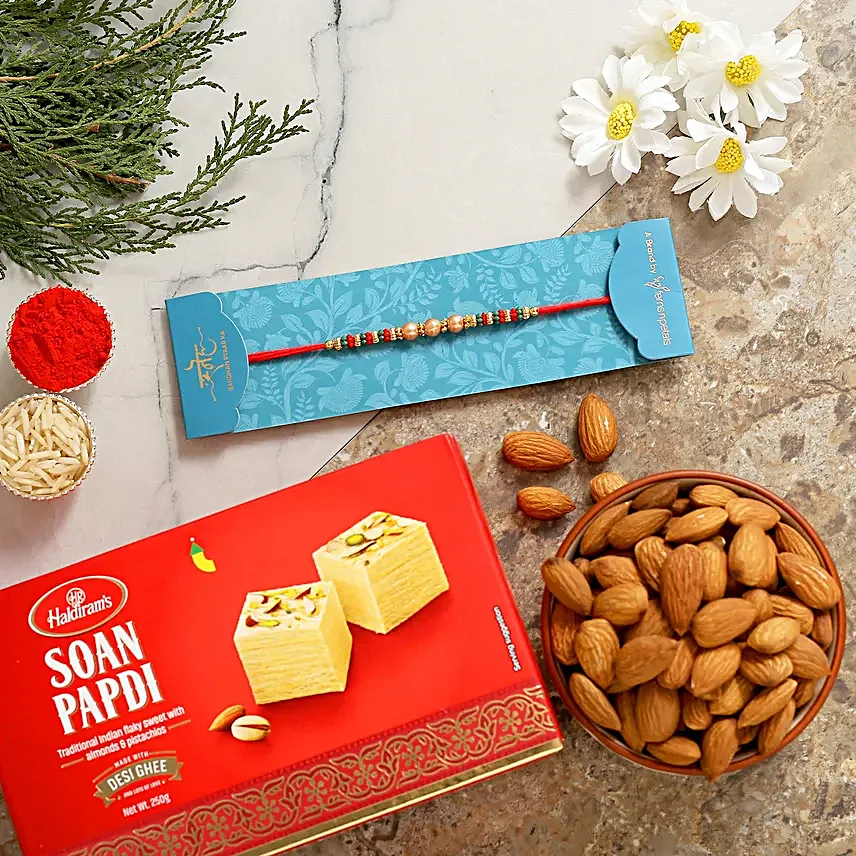 Pearl Mauli Rakhi With Soanpapdi And Almonds