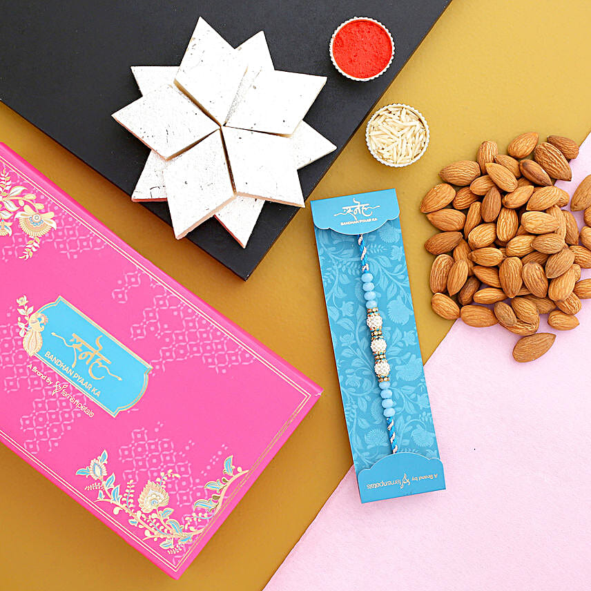 Sea Blue Pearls Rakhi And Almonds With Kaju Katli