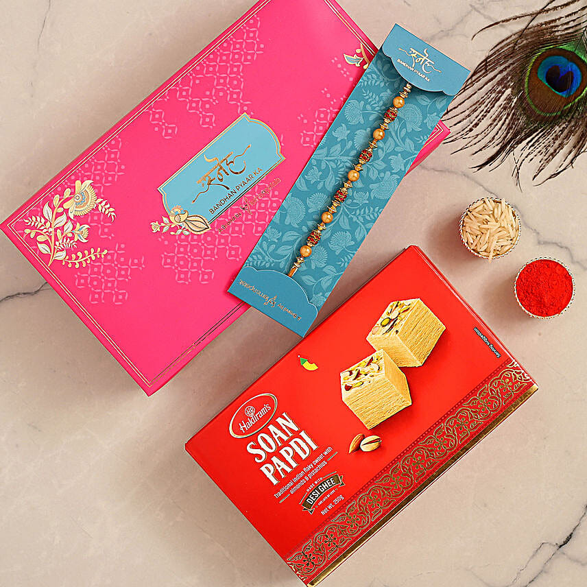 Traditional Golden Pearl Rakhi And Soan Papdi