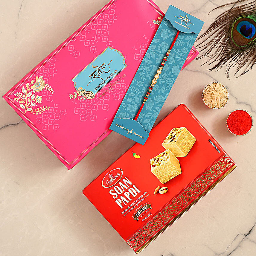 Traditional Pearl Studded Mauli Rakhi And Soan Papdi