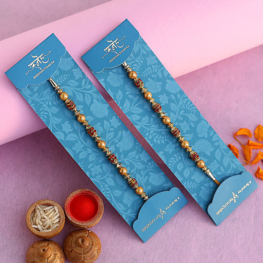 Traditional Pearl Studded Rakhi Set And Soan Papdi