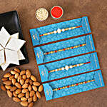 4 Pearl Studded Rakhis And Almonds With Kaju Katli