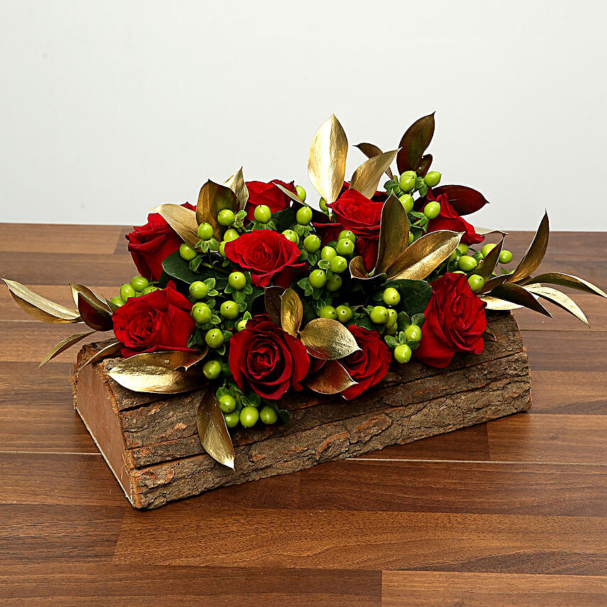 Red Roses In Wooden Base