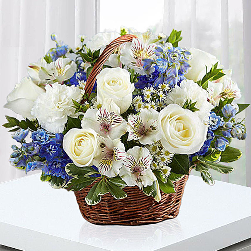 Blue and White Blooms Basket:Same Day Condolence Flowers in UAE