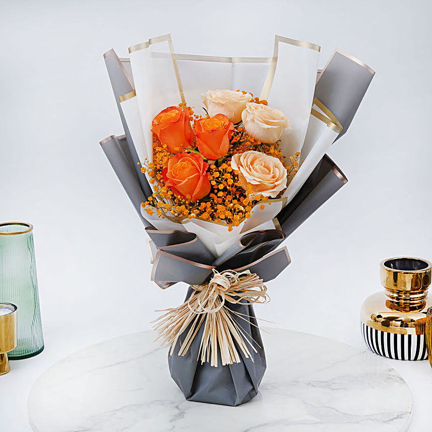 Orange and Peach Roses Bouquet:Rakhi Gifts for Sister in Dubai