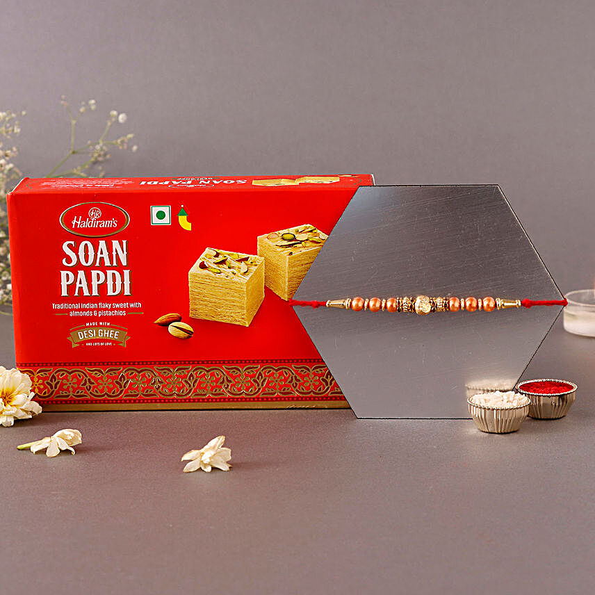 Rose Gold Pearl And Beads Rakhi with 500 Grams Soan Papdi