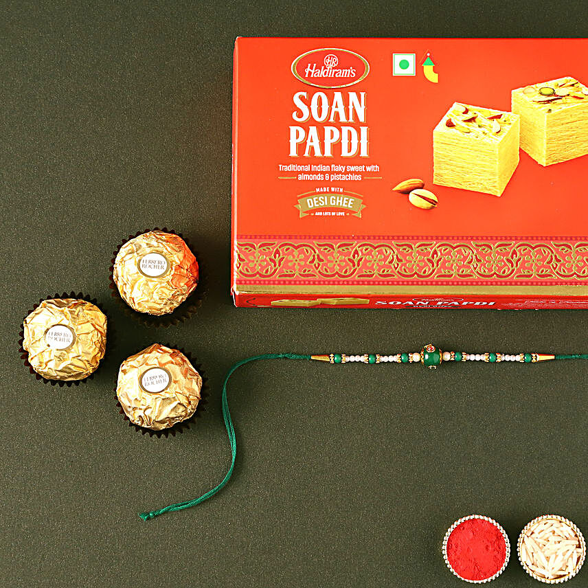 Sneh Fancy Green Rakhi with 3 Pcs Ferrero Rocher and Soan Papdi:Send Ethnic Rakhi to UAE