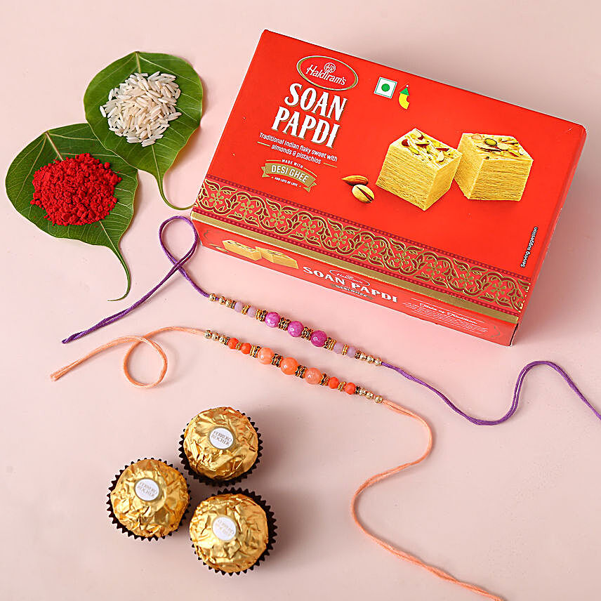 Sneh Peachy Rakhi Set with 250 Grams Soan Papdi and 3 Ferrero Rocher:Set of 2 Rakhi to UAE