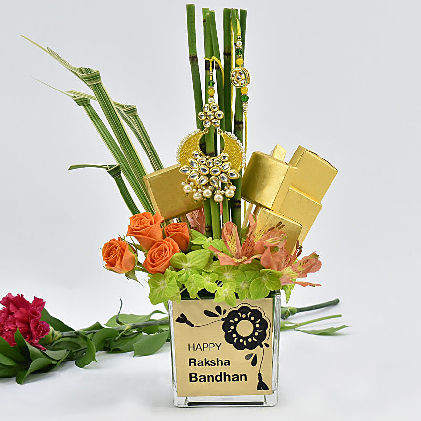 Special Raksha Bandhan Arrangement:Rakhi With Flowers to UAE