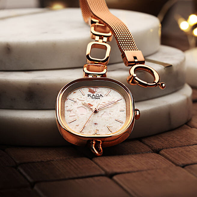 Titan Raga Delight Pink Dial Analog Watch for her Paired with a