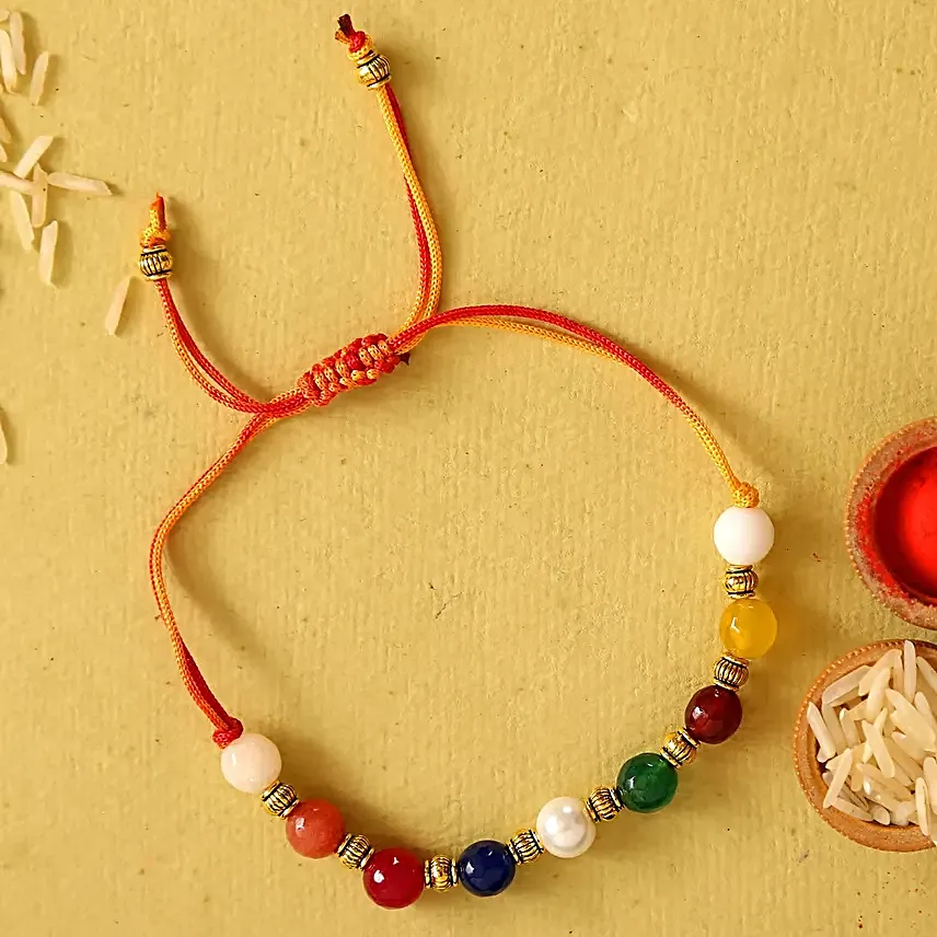 Navratan Sleek Designer Rakhi With Cashew & Almonds