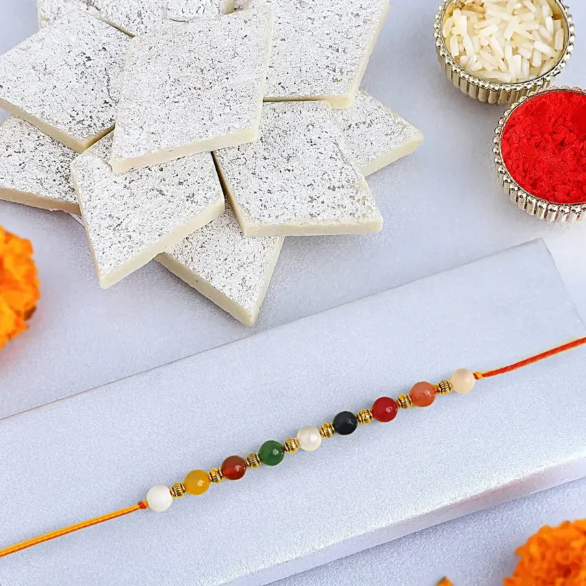 Navratan Sleek Designer Rakhi With Kaju Katli