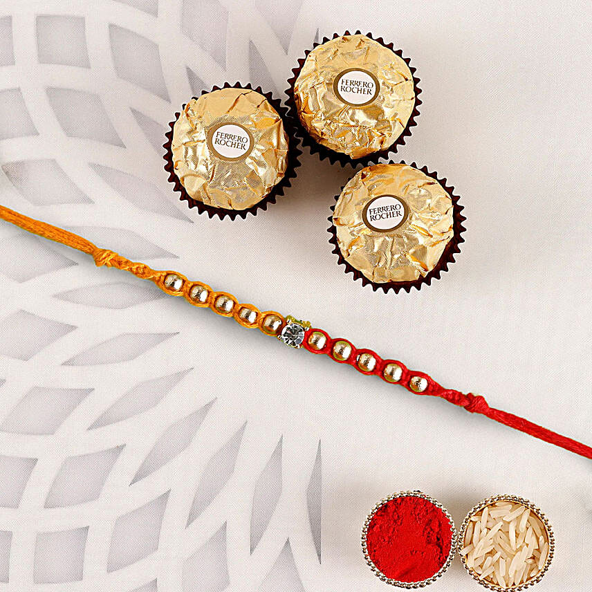 Red & Yellow Fancy Rakhi With Ferrero Rocher 3 Pcs