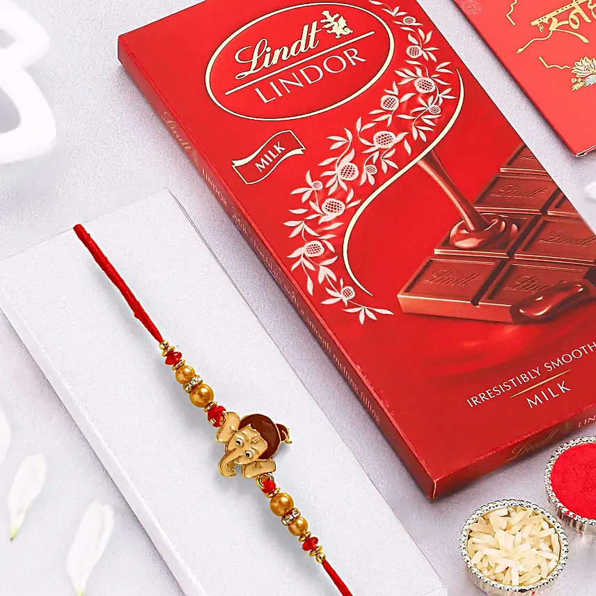 Long Trunk Bal Ganesha Pearl Rakhi For Kids And 1 Lindt Chocolate