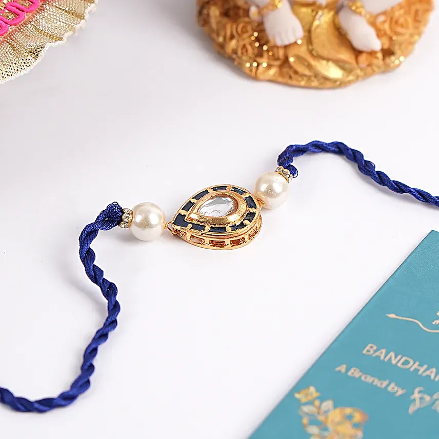 Leaf Shape W blue Thread Rakhi