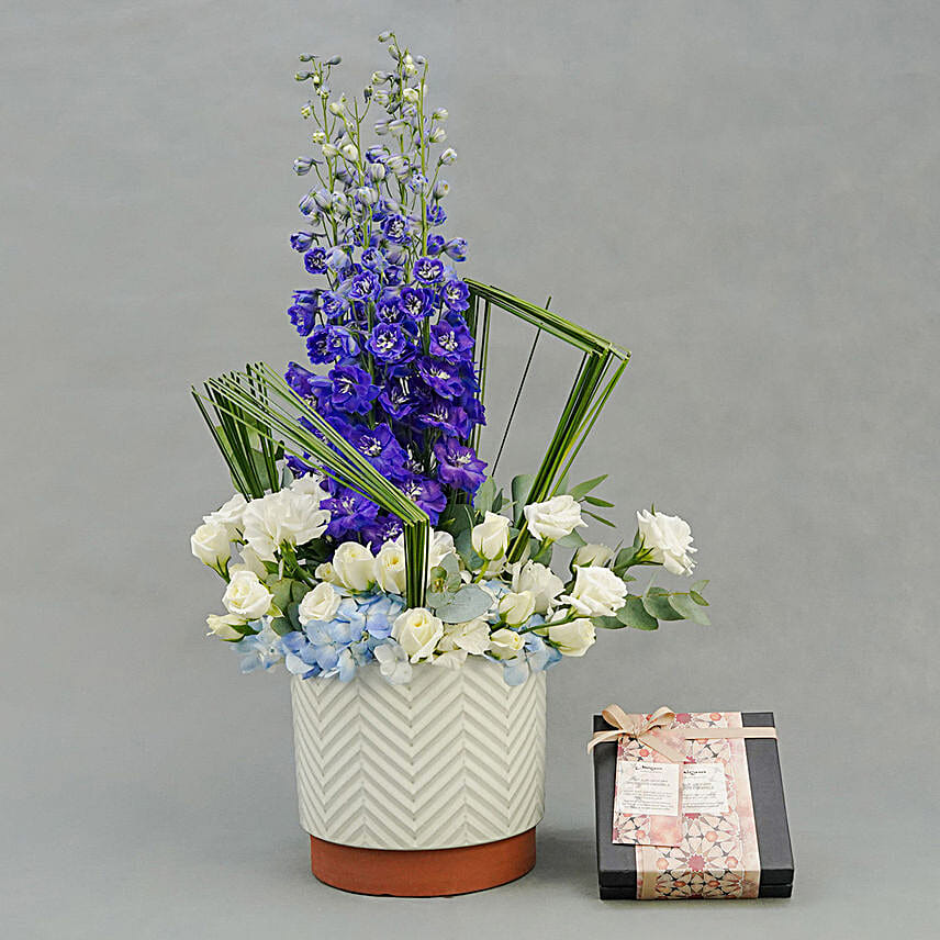 Peaceful Blue Flowers with Chocolates