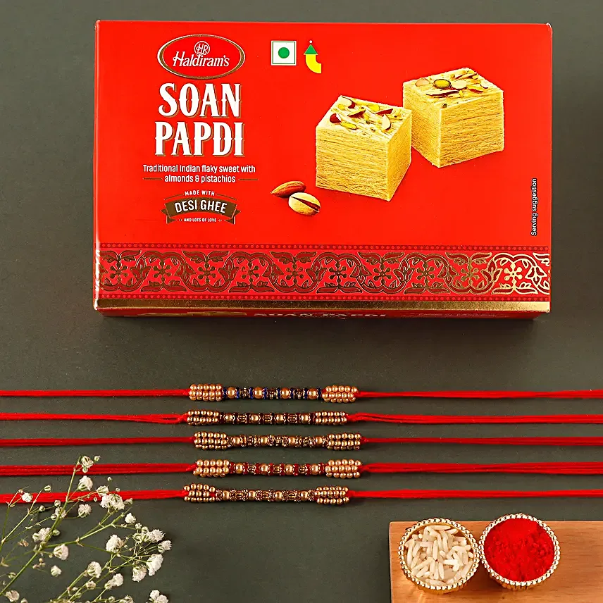 Sneh Colourful Pearl Rakhi Set with Soan Papdi