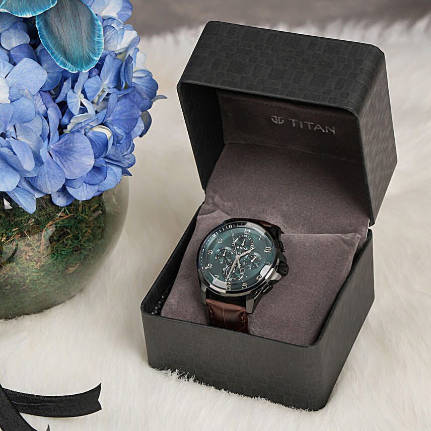 Titan Blue Dial Strap watch for men with exquisite floweral arrangment