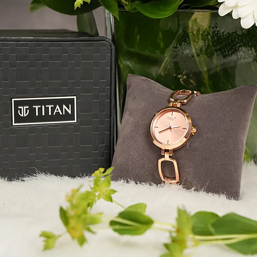 Titan Raga Rose Gold Dial Watch for Her Elegant Gift in a Glass Vase With Flowers