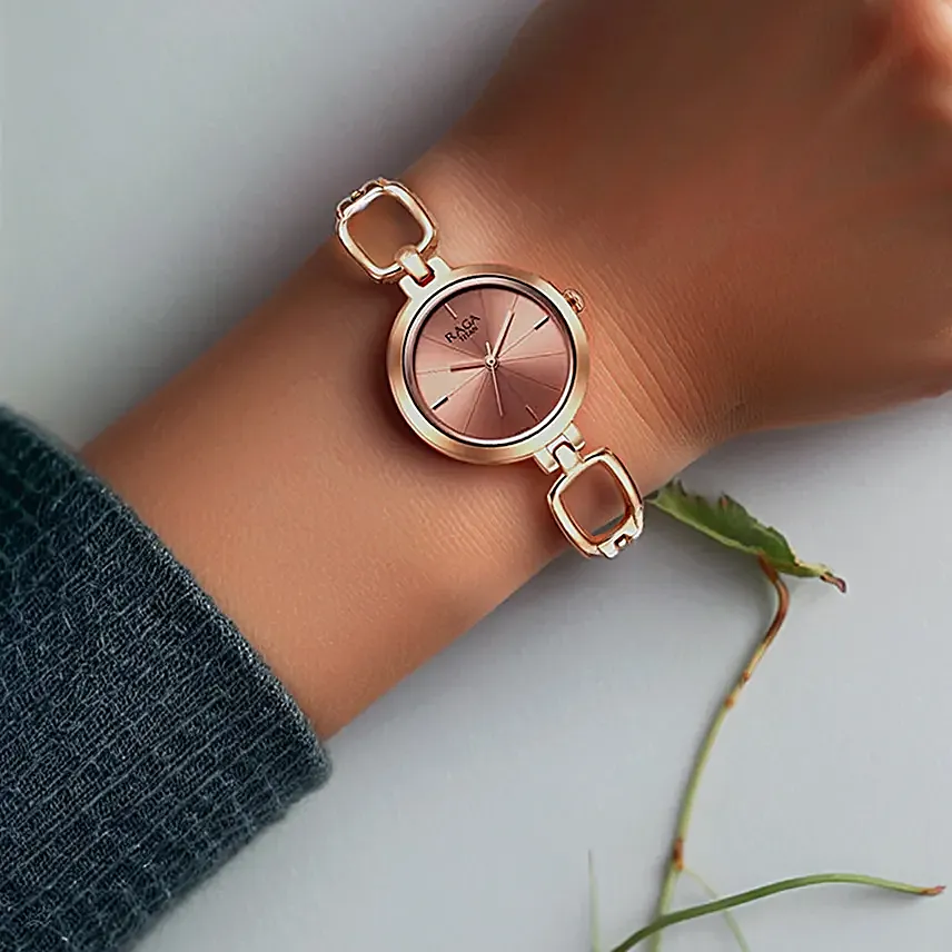 Titan Raga Rose Gold Dial Watch for Her Elegant Gift in a Glass Vase With Flowers