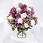 Purple and White Floral Bunch In Glass Vase