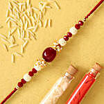 Red Beads Pearl Designer Rakhi And Healthy Almonds
