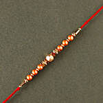 Rose Gold Pearl And Beads Rakhi with 6 Ferrero Rocher and Cashew
