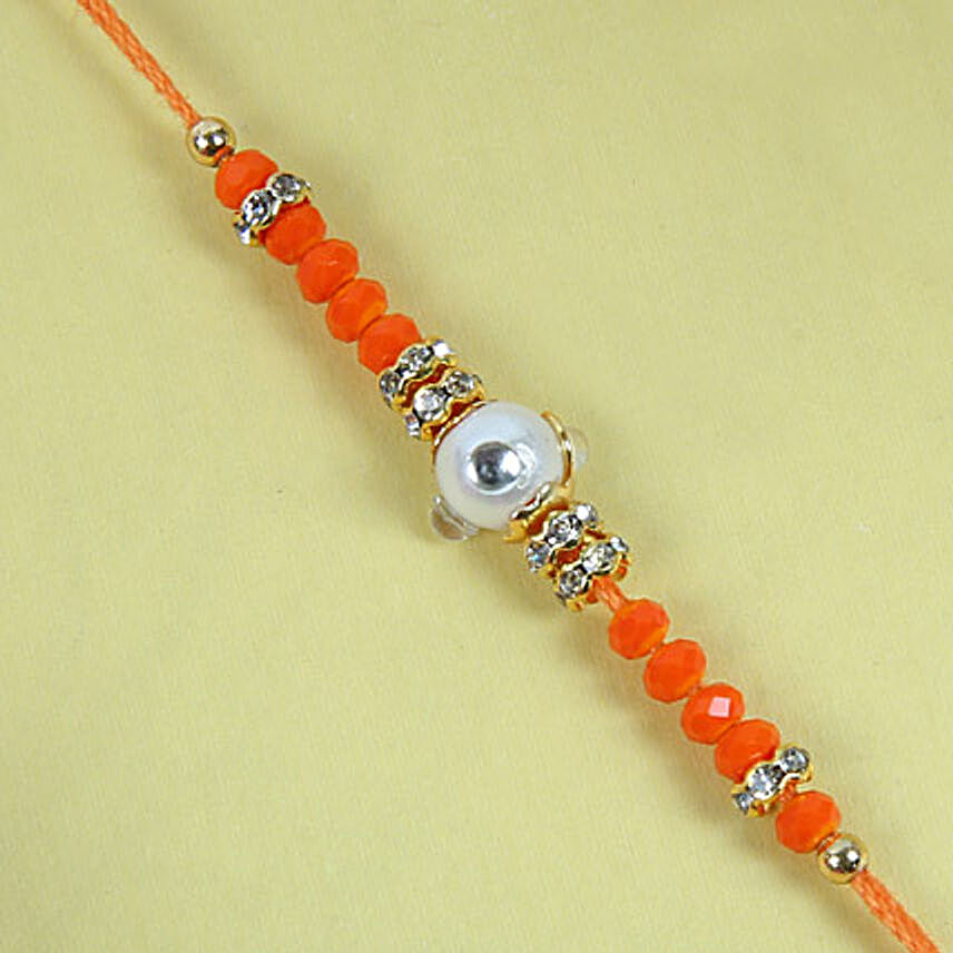 Fancy Orange Diamond Rakhi