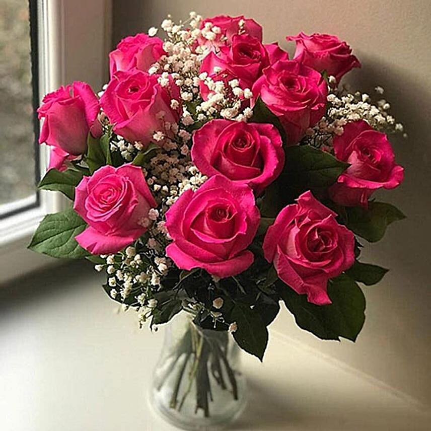 Lovely Red Roses And Gypsophila Arrangement