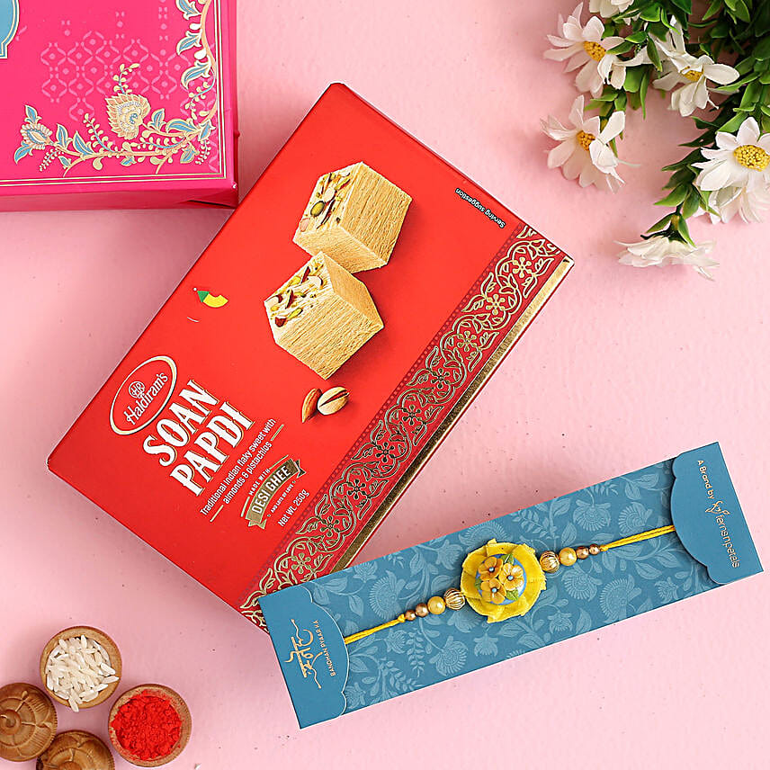 Yellow Flower Pearl Kids Rakhi And Soan Papdi
