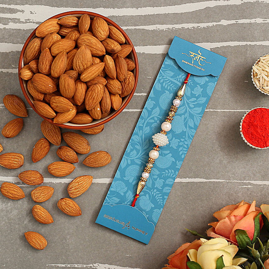 Elegant Pearl Mauli Rakhi And Healthy Almonds:Rakhi With Dry Fruits to UK