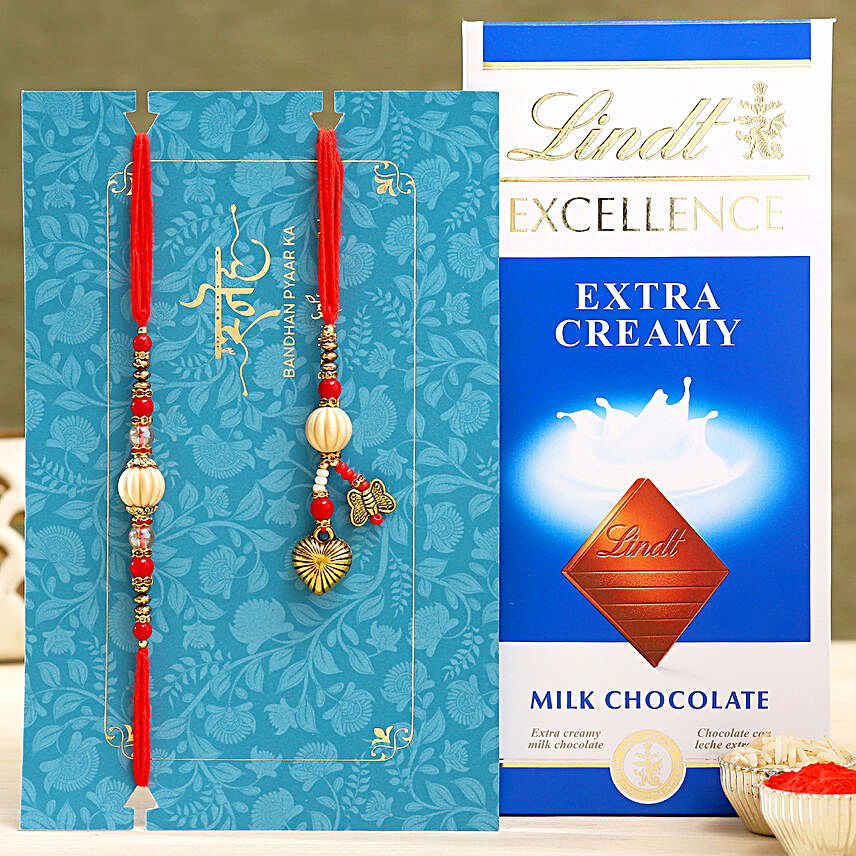 Red Pearl And Lumba Rakhi Set With Lindt