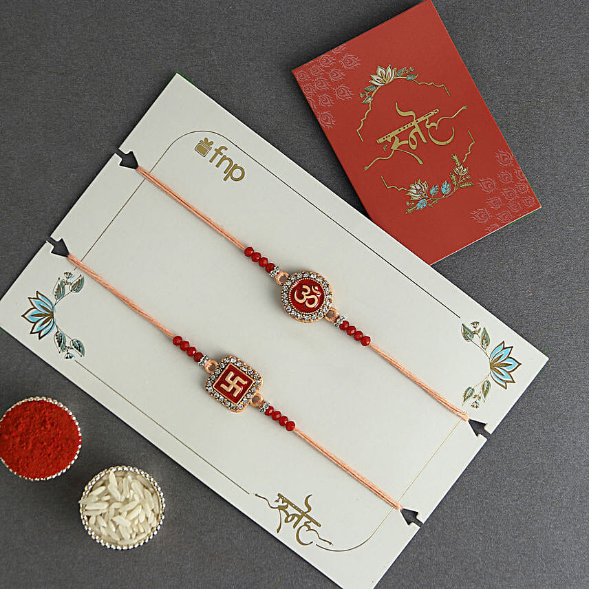 Ethereal Om Swastik Pair Rakhi N Motichoor Laddoo