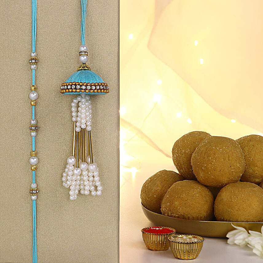 Teal Jhumar Lumba Pearl Rakhi Set N Besan Laddoo Surprise