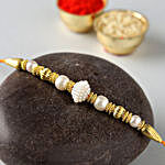 Divine Golden Pearl Thread Rakhi With Kaju Katli Box