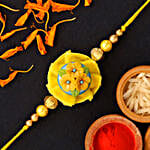 Yellow Flower Pearl Kids Rakhi And Soan Papdi