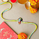 Melodic Krishna Rakhi For Kids & Soan Papdi Delight
