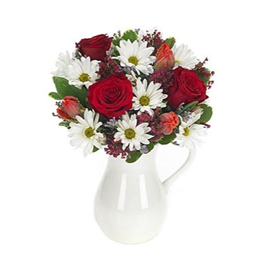 Gorgeous Floral Arrangement With White Pitcher Vase